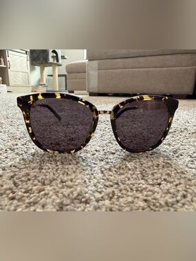 Gucci tortoiseshell sunglasses